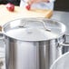 A Vollrath Optio pot with a lid on it.