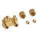 A close-up of a gold Vulcan dual pilot valve with brass fittings and nuts and bolts.