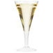 A clear plastic Fineline Tiny Barware champagne flute filled with yellow liquid.