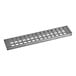 A grey metal Garland bottom grate with holes.