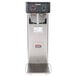 A silver and black Bunn 3 gallon iced tea brewer on a stand.