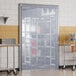 A white sliding strip door on a rolling cart.