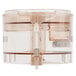 A clear plastic container with a metal lid.