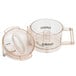 A clear Waring grinding bowl with a white cover.