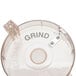 A clear plastic grinding bowl cover with a hole in it.