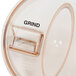 A clear plastic Waring grinding bowl with a lid.