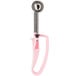 A pink and silver Vollrath ice cream scoop with a black squeeze handle.