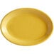 A yellow oval platter with a white border.