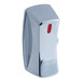 A chrome-plated Vulcan range knob with a red button.