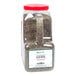 A plastic container of Regal Coarse Grind Black Pepper with black and brown grains.