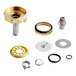 A Hobart rebuild kit with gold and silver metal parts.