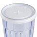 A clear plastic Cambro cup with a translucent lid with straw slot.