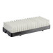 A black rectangular Beverage-Air condensate pan with white rectangular strips.