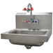 A stainless steel Advance Tabco hand sink with a faucet and emergency eye wash attachment.