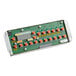 A green circuit board with orange and white buttons and a digital display.