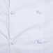 A close up of a Mercer Culinary white chef coat with cloth knot buttons.