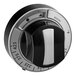 A black and silver knob with white numbers.