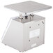 An Edlund stainless steel portion scale with a square metal tray.