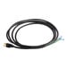 A black cord with white and green wires and a white plug.