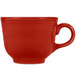 a red coffee cup with a handle