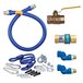 A blue Dormont gas connector kit with fittings and a restraining cable.