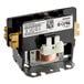 A black and gold Manitowoc Ice contactor with copper wires.