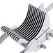 A metal Vollrath pusher head assembly with several metal parts.
