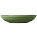 a green bowl with a white background