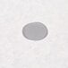 A close-up of a grey circle on white paper.