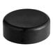 A black circular plastic cap.