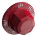 A red plastic Vulcan knob with white text.