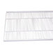 A white coated wire shelf with a metal grid.
