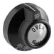 An American Range black knob with white text that says "Oven"