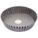 A round metal Gobel fluted tart pan with removable bottom.