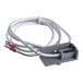 A grey cable with a white connector, red and black wires.