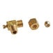 A brass Vulcan adjustable valve with a nut.