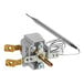 A Metro thermostat with a wire and metal rod.