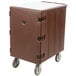 A dark brown Cambro food pan cart with wheels.