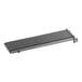 A black cast metal Garland broiler grate.