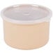 A beige Carlisle plastic crock with a white lid.