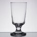 An Anchor Hocking Excellency footed highball glass on a table.