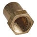 A close-up of a brass threaded nut.