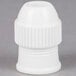 A white plastic object with a white cap.