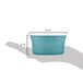 A close-up of a turquoise Fiesta china ramekin.