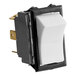 A white and black Metro selector switch with a white button.