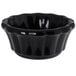 a black bowl with a handle