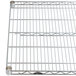 A Metro chrome wire shelf with metal bars.