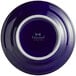 A Tuxton Concentrix cobalt blue china plate with a white rim.