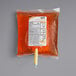 A bag of golden liquid Kutol Health Guard Antibacterial Hand Soap with a label.