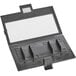 A black rectangular plastic battery cover for an Edlund digital scale.